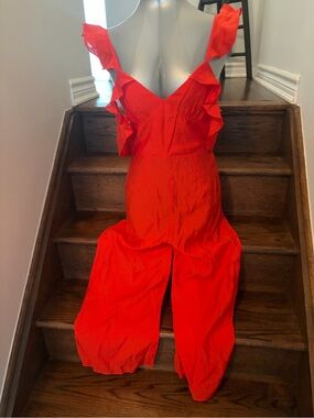 Ruffled Red Jumpsuit with V-Neck